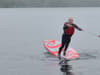 Liberal Democrats leader Sir Ed Davey falls into lake while paddleboarding in bizarre video