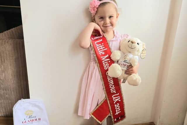 Elouise, back at home with her sash and crown after winning Little Miss Glamour UK 2024.