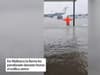 Mallorca airport flooding: Man stands knee deep in water on runway and rain gushes through duty-free ceiling