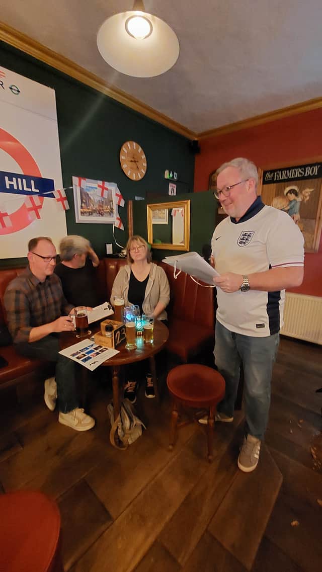 Paul Moss, in England shirt, with punters inside the The New Crown. Photo: The New Crown / SWNS